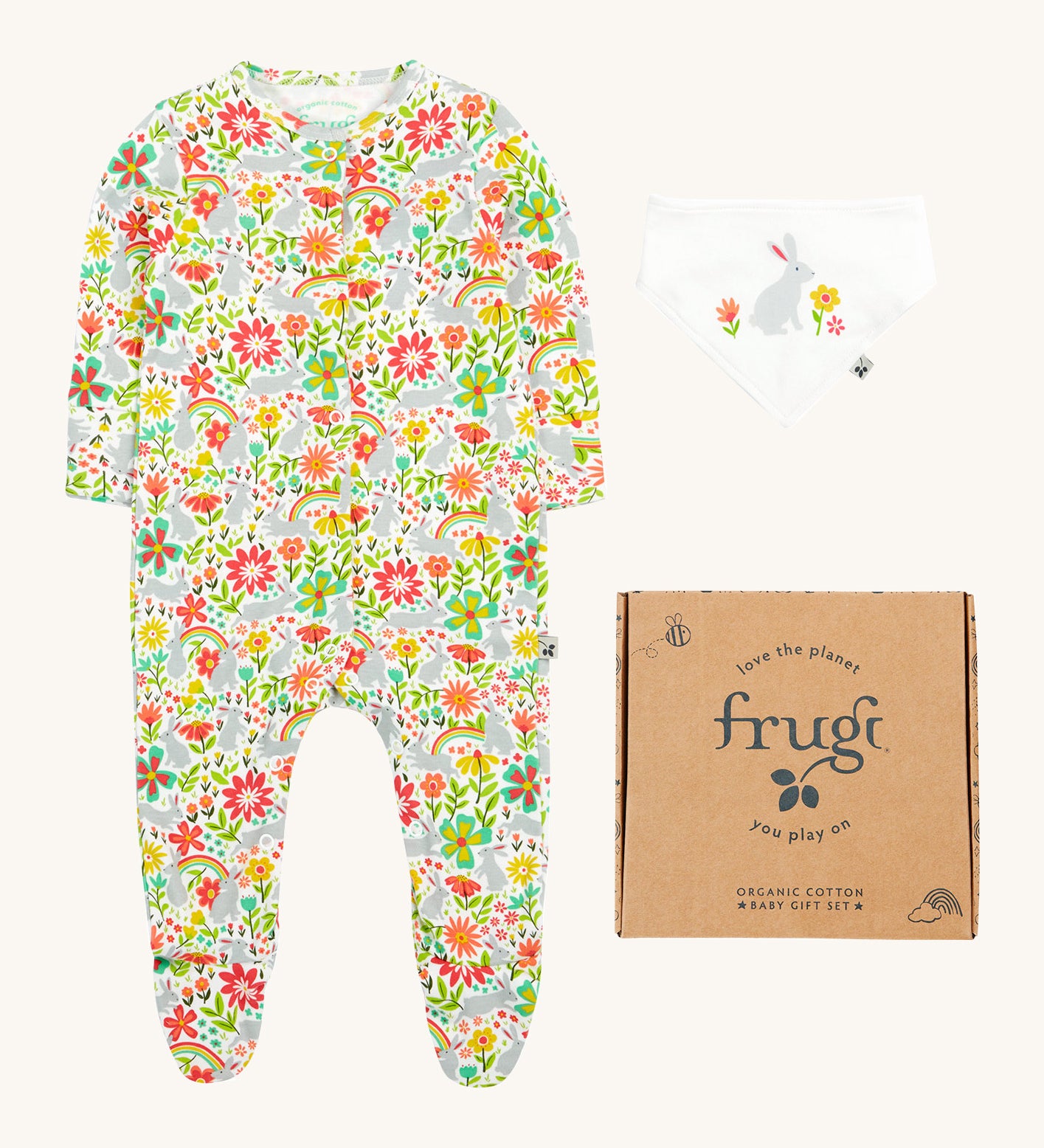 Frugi baby peony bunny gift set - GOTS organic cotton baby gift set. Features a babygrow with grey bunny rabbits and a collection of coloured flowers with a matching white bib with a grey rabbit. Includes a decorated cardboard box.