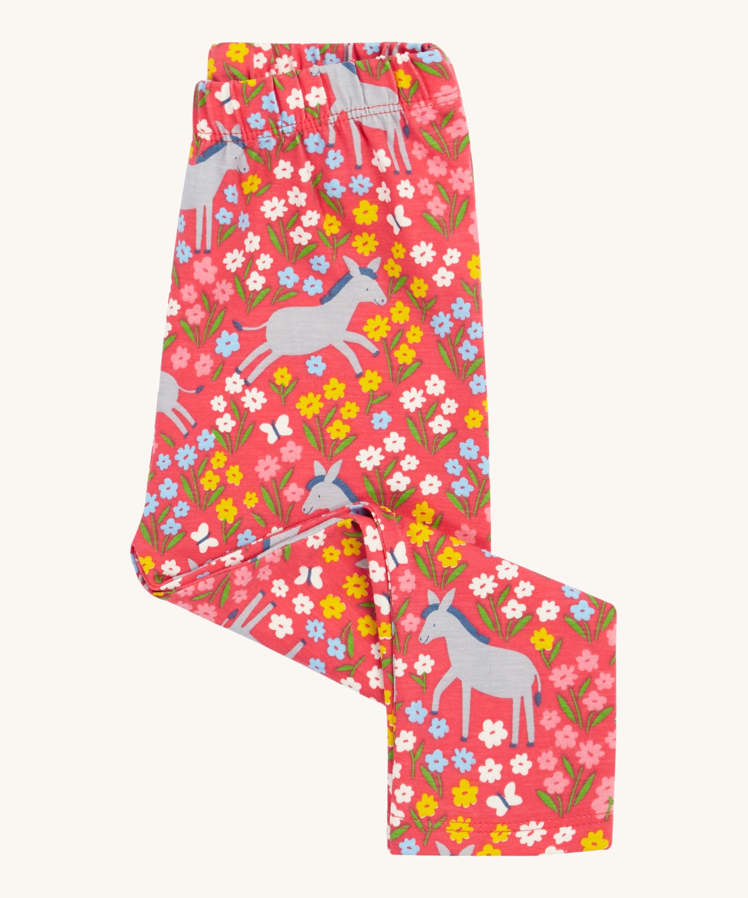 Frugi kids donkey drove bounce libby leggings - GOTS organic cotton kids light pink leggings folded in half. Features a multicoloured flower design with grey donkeys.