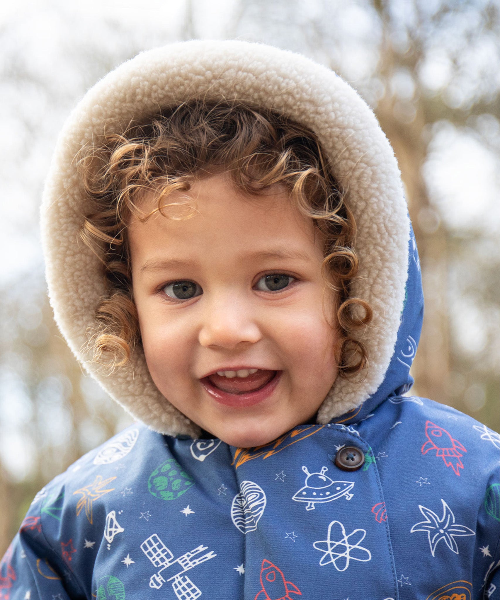 A child walking outside