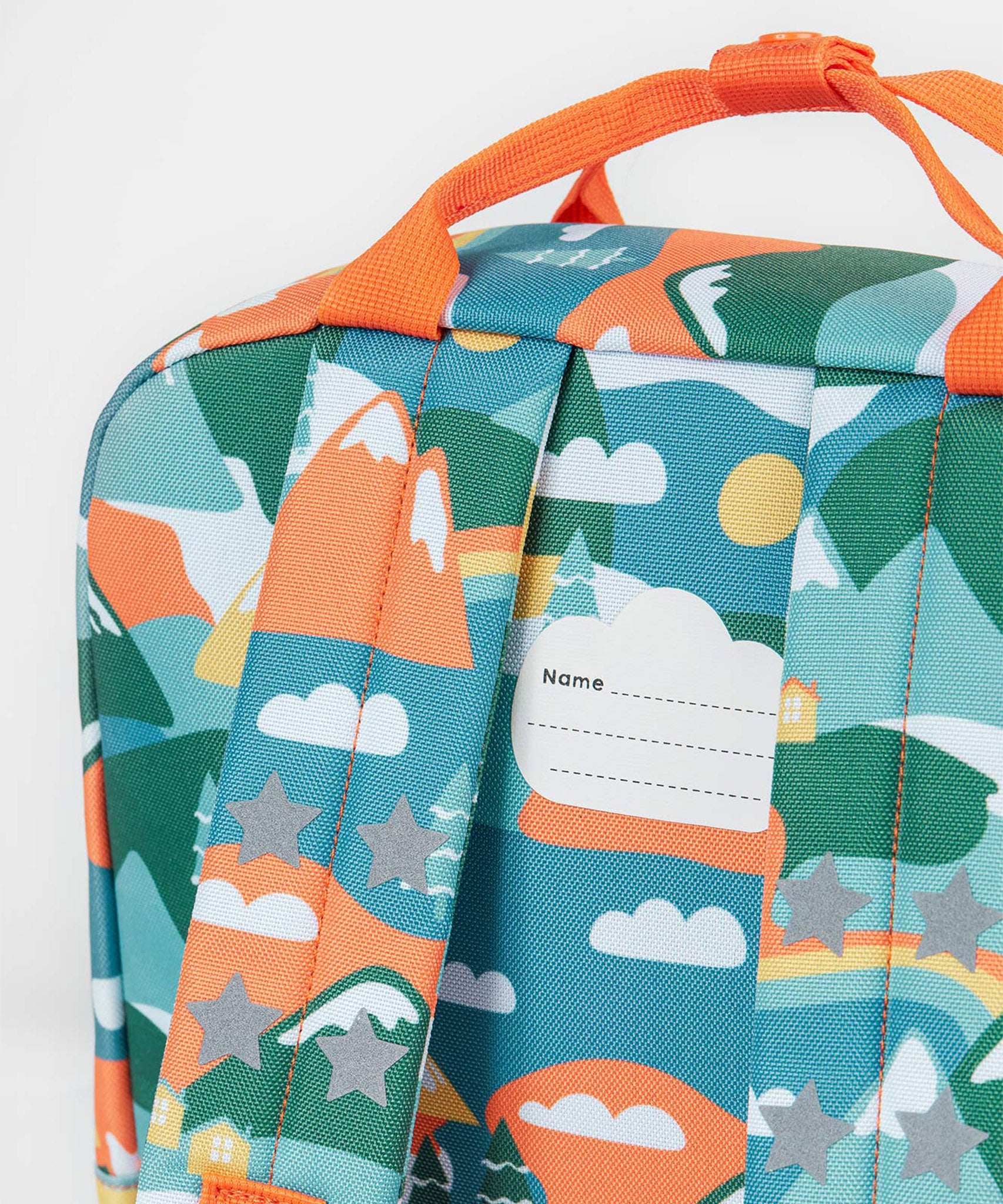 The back of the Frugi Children's Explorers Backpack - Alpine Adventures showing the shoulder straps and chest strap