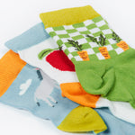 Close up of the Frugi baby farm field 3 pack socks. Showing the 3 unique and vibrant Frugi farm related prints with elasticated ankle cuffs on organic cotton fabric