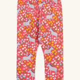 Frugi kids donkey drove bounce libby leggings - GOTS organic cotton kids light pink leggings. Features a multicoloured flower design with grey donkeys.