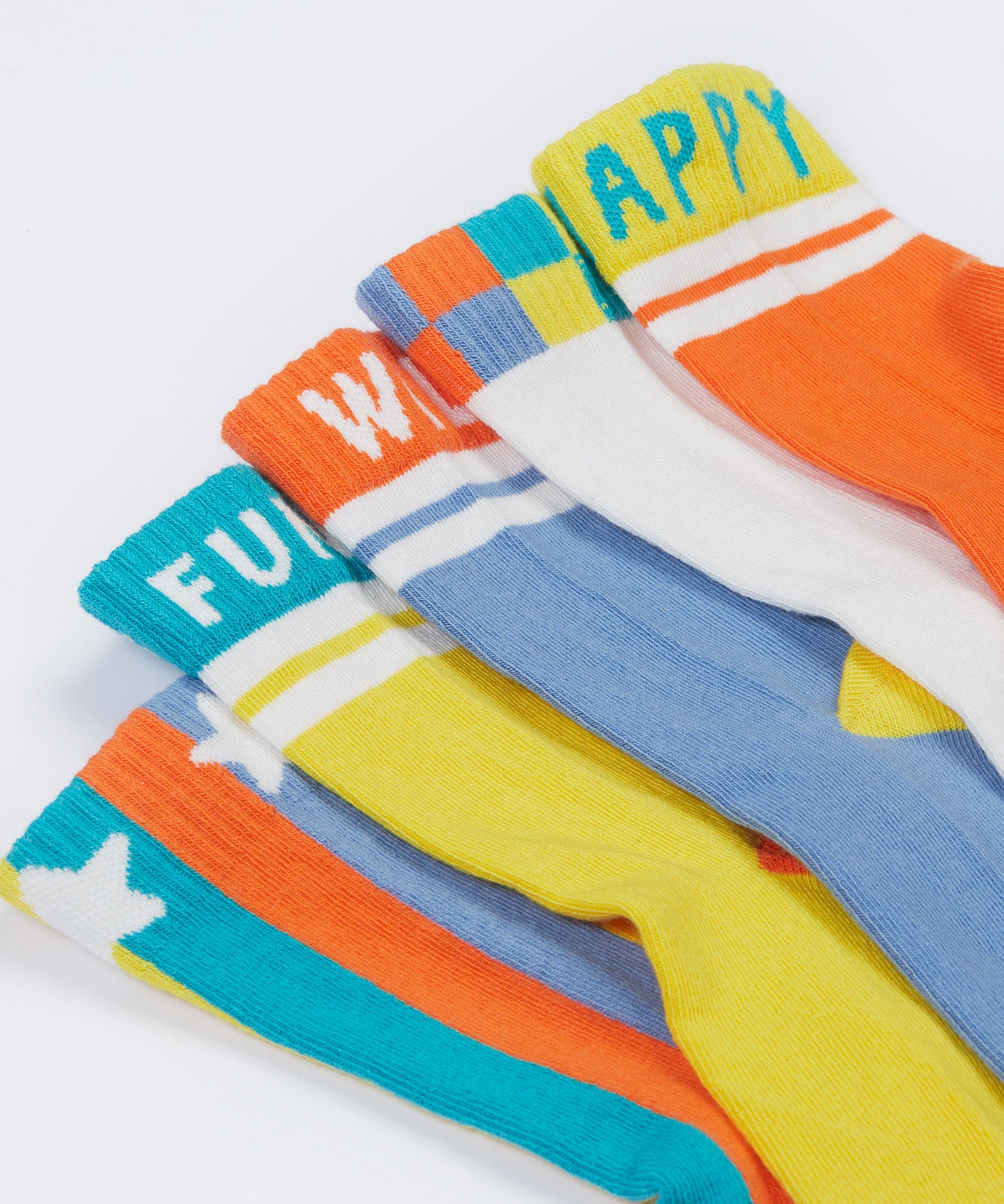 Close up of the Frugi kids have fun sunnie socks 5 pack. Showing the elasticated cuffs with different fun Frugi slogan on vibrant organic cotton fabric.