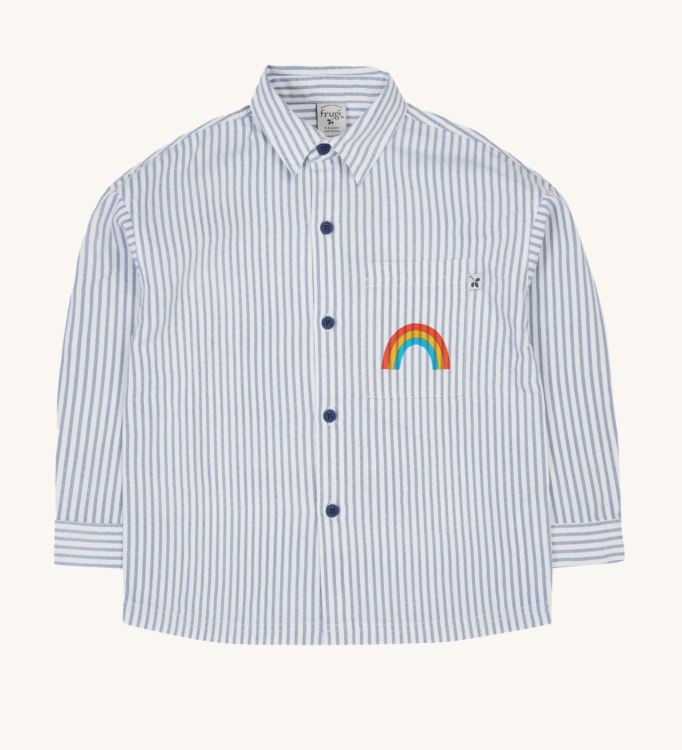 Frugi kids shacket, shirt with blue and white stripes and rainbow design on a cream background.