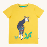 Frugi kids bumblebee okapi character t-shirt - GOTS organic cotton Frugi kids t-shirt in yellow with short sleeves and a green trim on the inside of the neck. Features an appliqué of a okapi animal on thefron next to some green plants