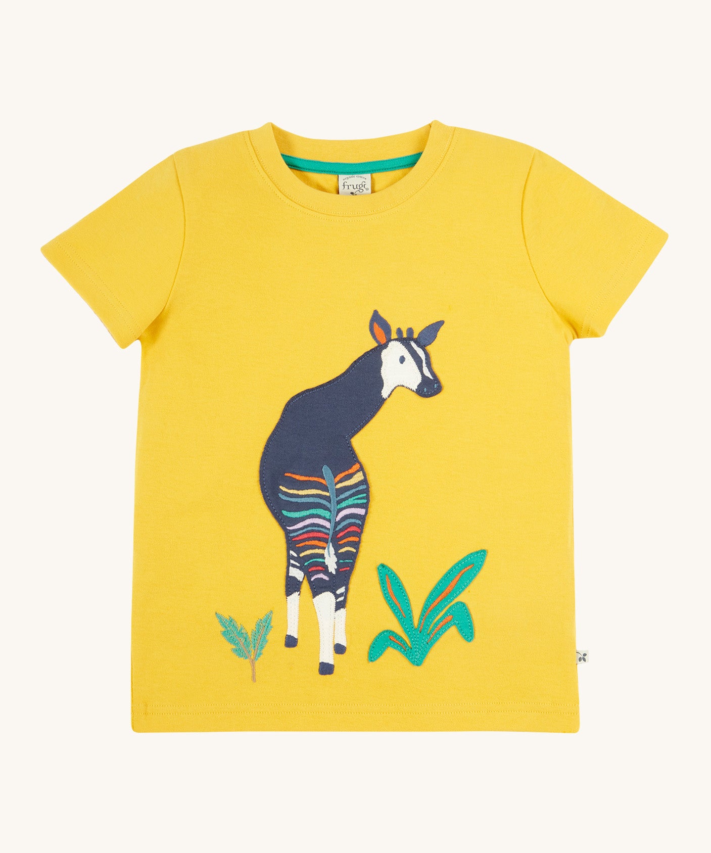 Frugi kids bumblebee okapi character t-shirt - GOTS organic cotton Frugi kids t-shirt in yellow with short sleeves and a green trim on the inside of the neck. Features an appliqué of a okapi animal on thefron next to some green plants