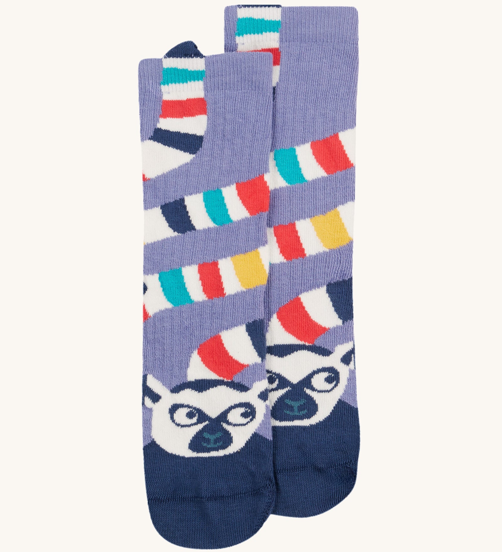 Frugi kids character sock showing the navy lemur design with a multicoloured stripe tail on a light purple organic cotton fabric