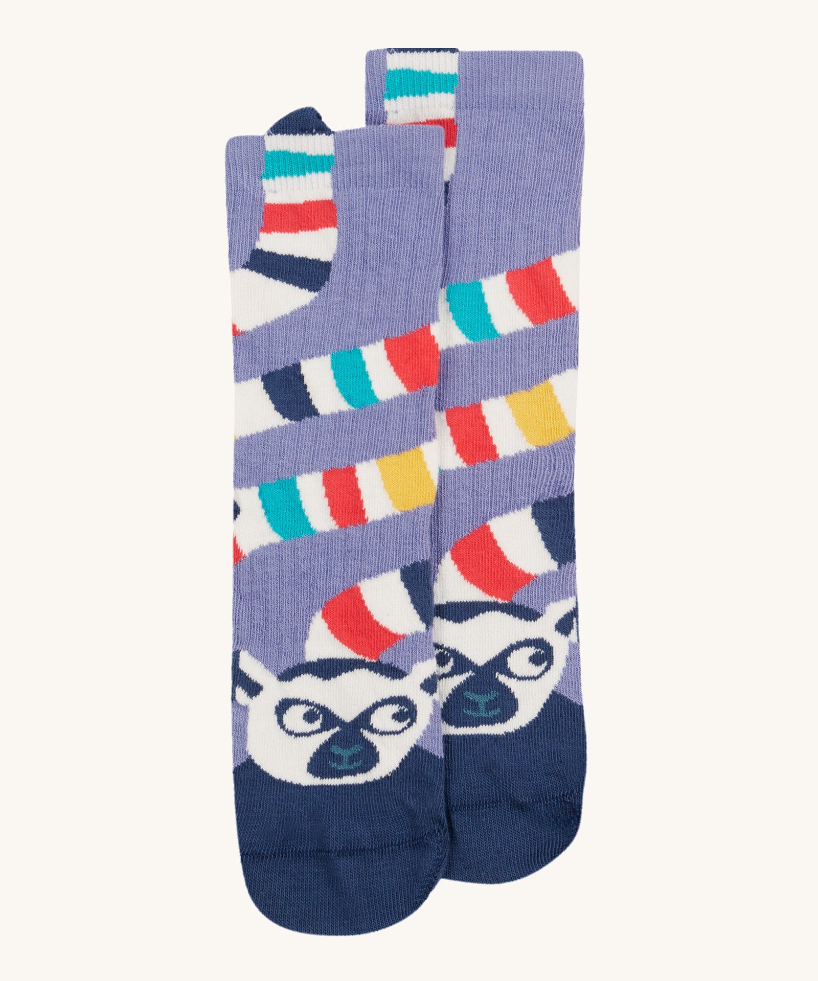 Frugi kids character sock showing the navy lemur design with a multicoloured stripe tail on a light purple organic cotton fabric