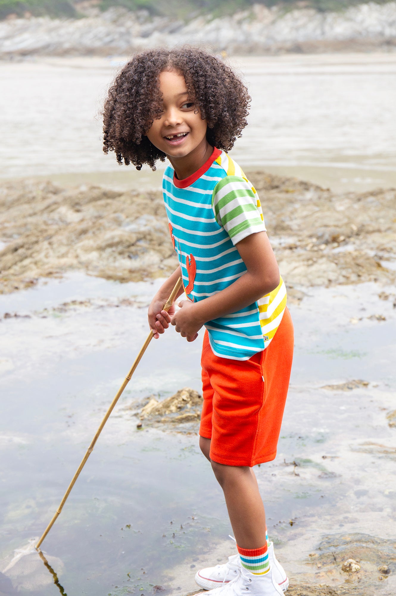 A closer view of the Frugi Children's Organic Cotton Hotchpotch Applique T-Shirt - Lobster. A colourful multi stripe Frugi T-Shirt for children