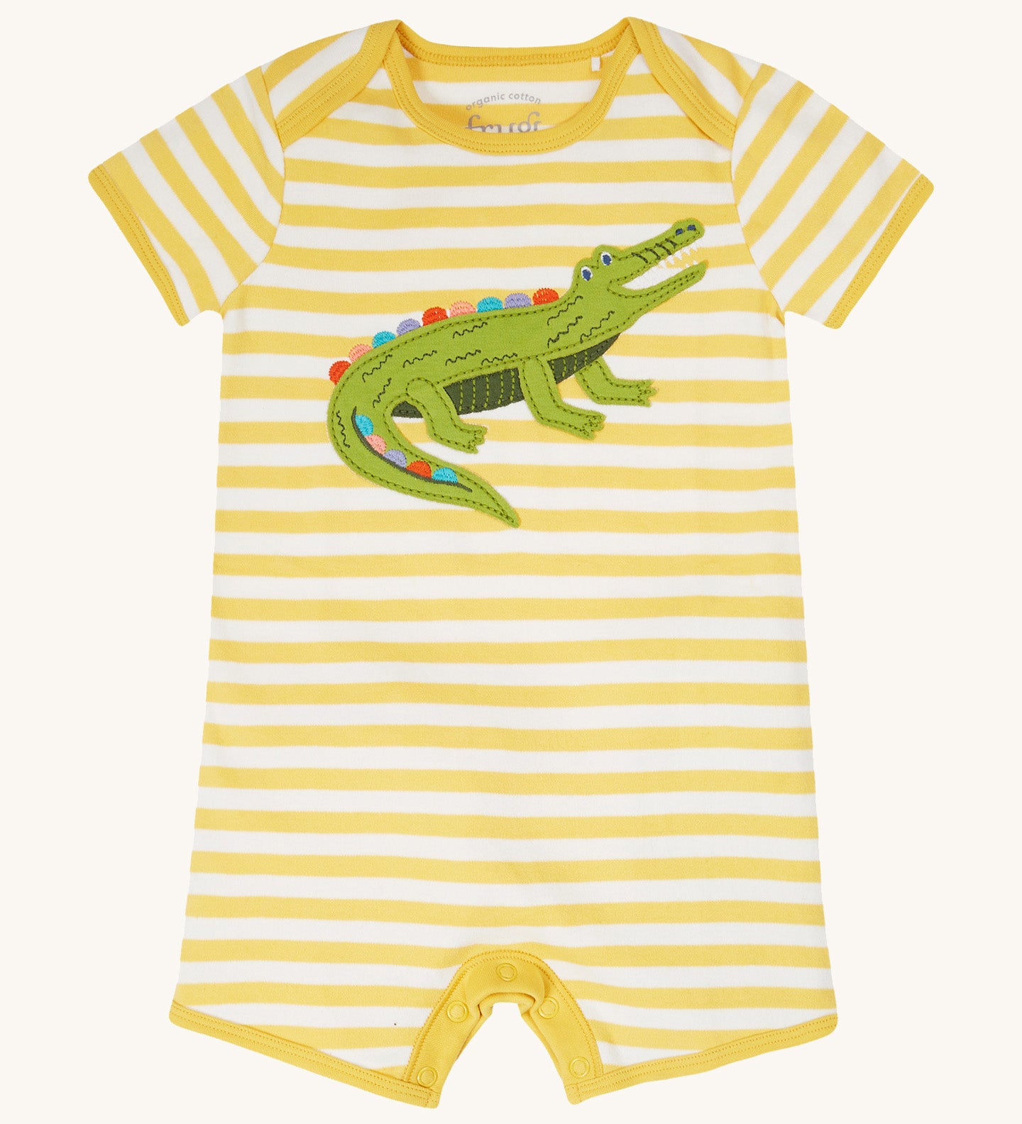 Frugi kids crocodile rue romper - GOTS organic cotton romper with yellow and white stripes, short sleeve and legs. Features an appliqué of a green crocodile on the front and popper fasteners on the inside of the legs for easy fitting.