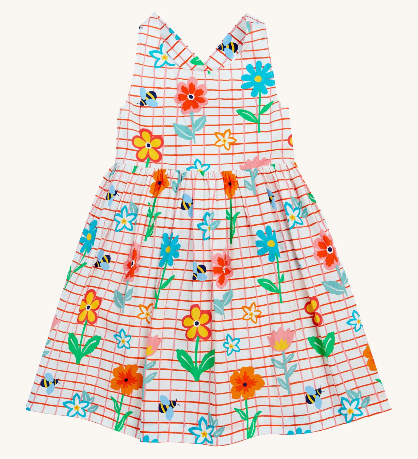 Frugi kids Delpi paint a floral dress - GOTS organic cotton kids dress with white check and red outline, sleeveless with a back strap fasteners. Features prints of different coloured flowers and bees. 