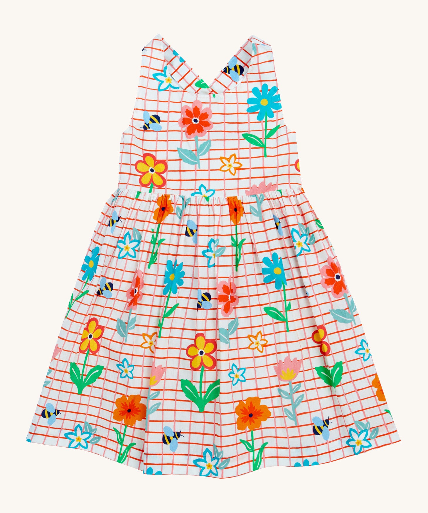 Frugi kids Delpi paint a floral dress - GOTS organic cotton kids dress with white check and red outline, sleeveless with a back strap fasteners. Features prints of different coloured flowers and bees. 