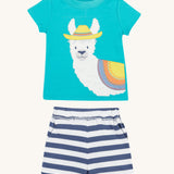 Frugi kids easy on outfit - GOTS organic cotton outfit with a light blue t-shirt, short sleeves and blue and white stripe shorts. Features a llama applique on the front wearing a hat and loose cotton thread as hair.