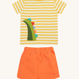 Frugi kids easy wrap around crocodile outfit. GOTS organic cotton Frugi kids outfit with a yellow and white stripe, short sleeve t-shirt, yellow neck trim and orange short. Features a crocodile's tail applique on the back of the t-shirt.