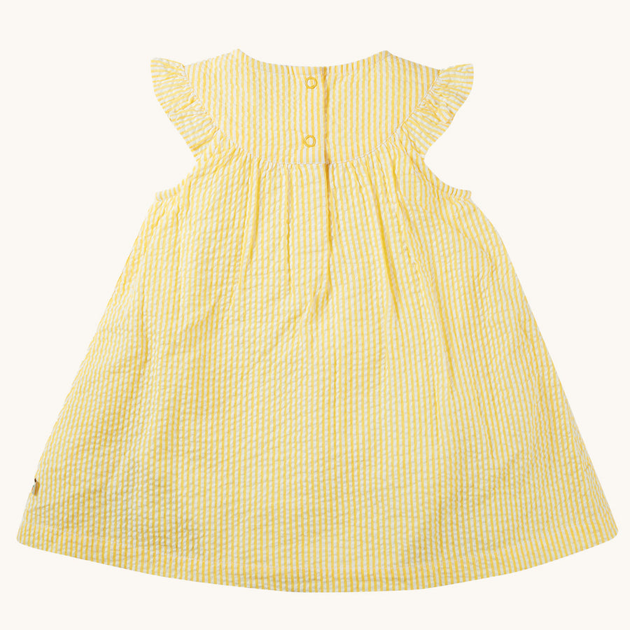 A closer view of the frilly shoulders on the Frugi Organic Cotton Devon Baby Body Dress - Flowers