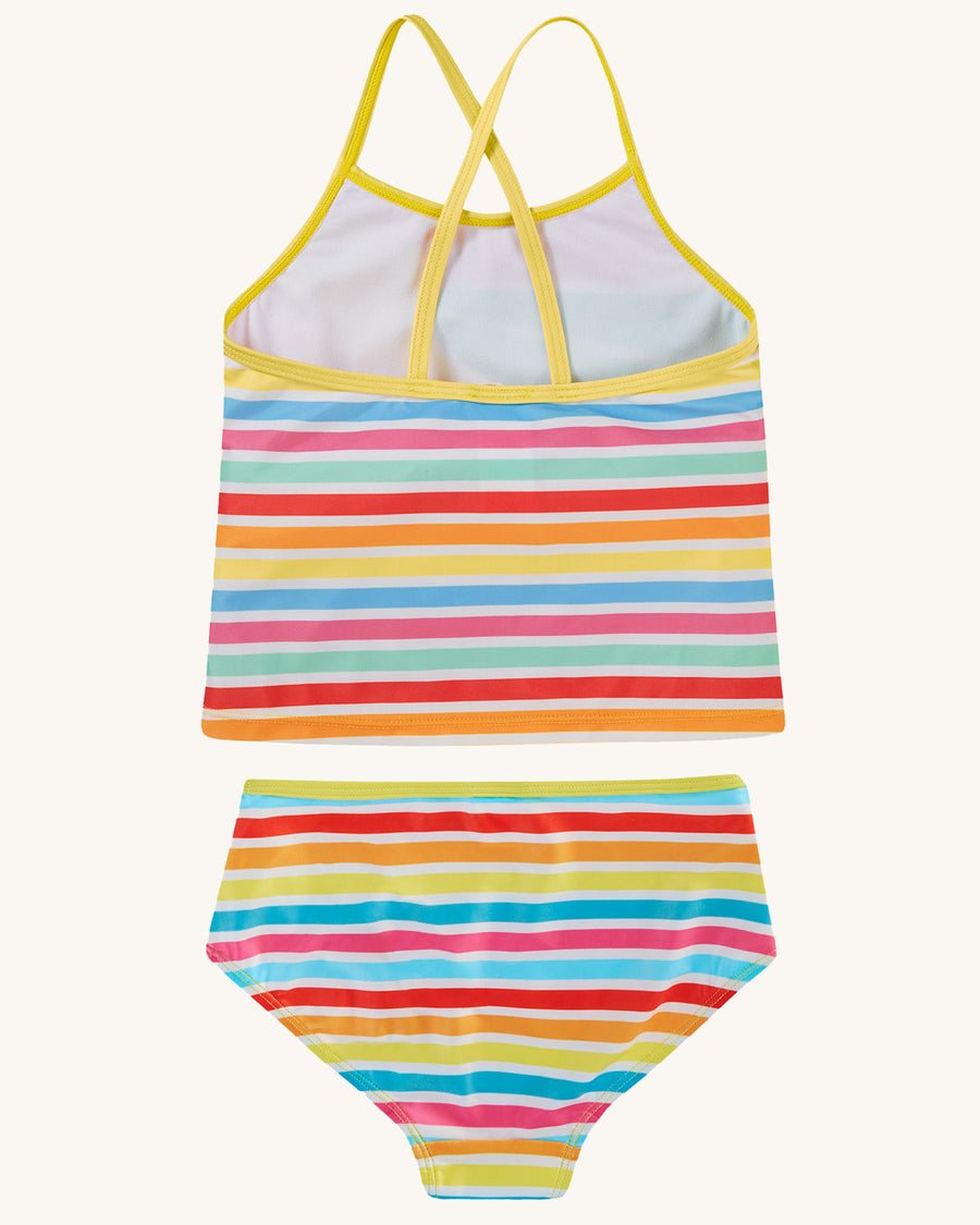 A close up view of the sun and yellow cross over shoulder straps on the Frugi Kiri Tankini - Sunshine. A beautiful and clolourful sunshine striped print tankini