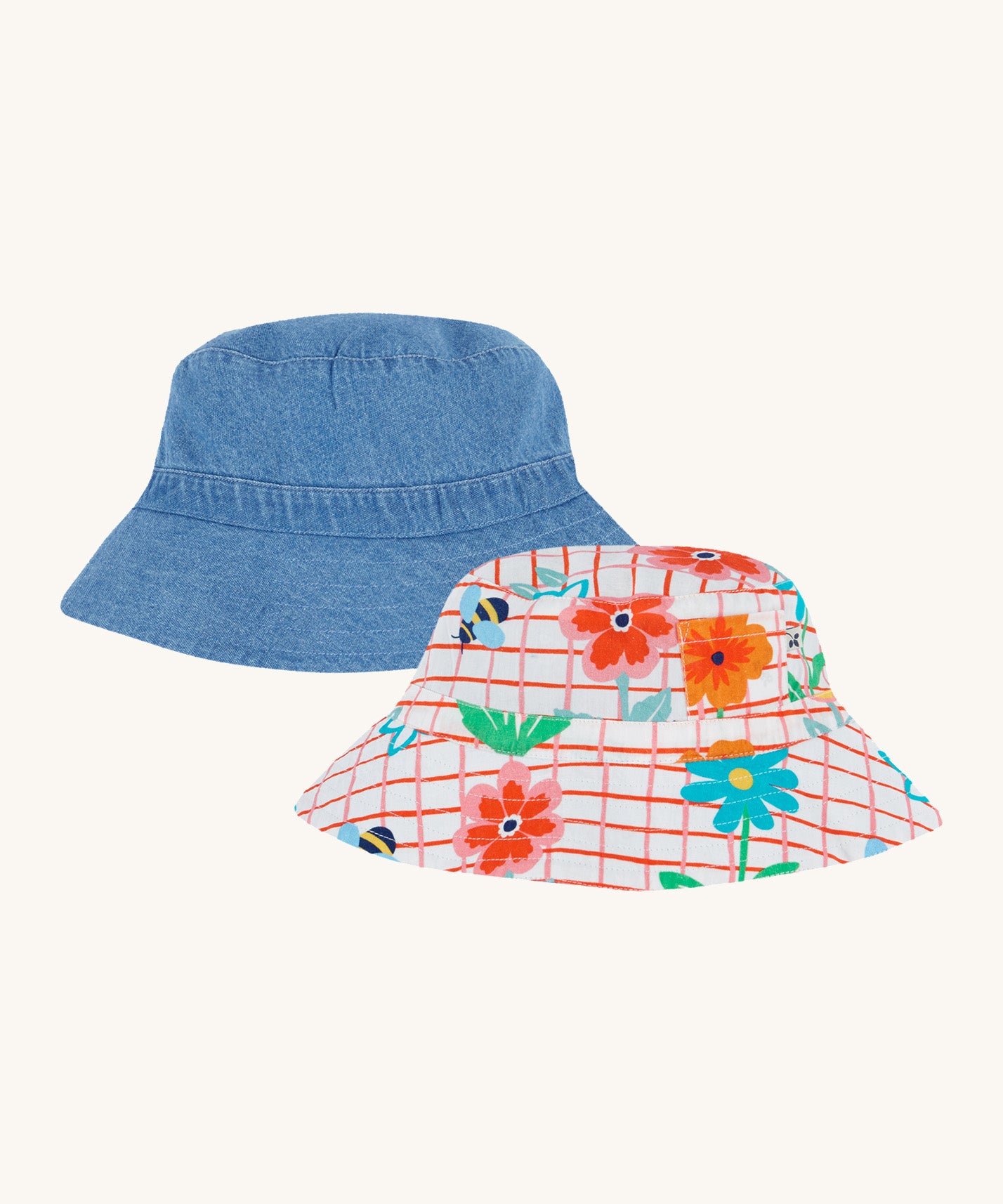 Frugi kids hattie reversible hat - GOTS organic cotton kids reversible bucket hat in denim with white squares and red lines. Featuring different flowers and a little side pocket 