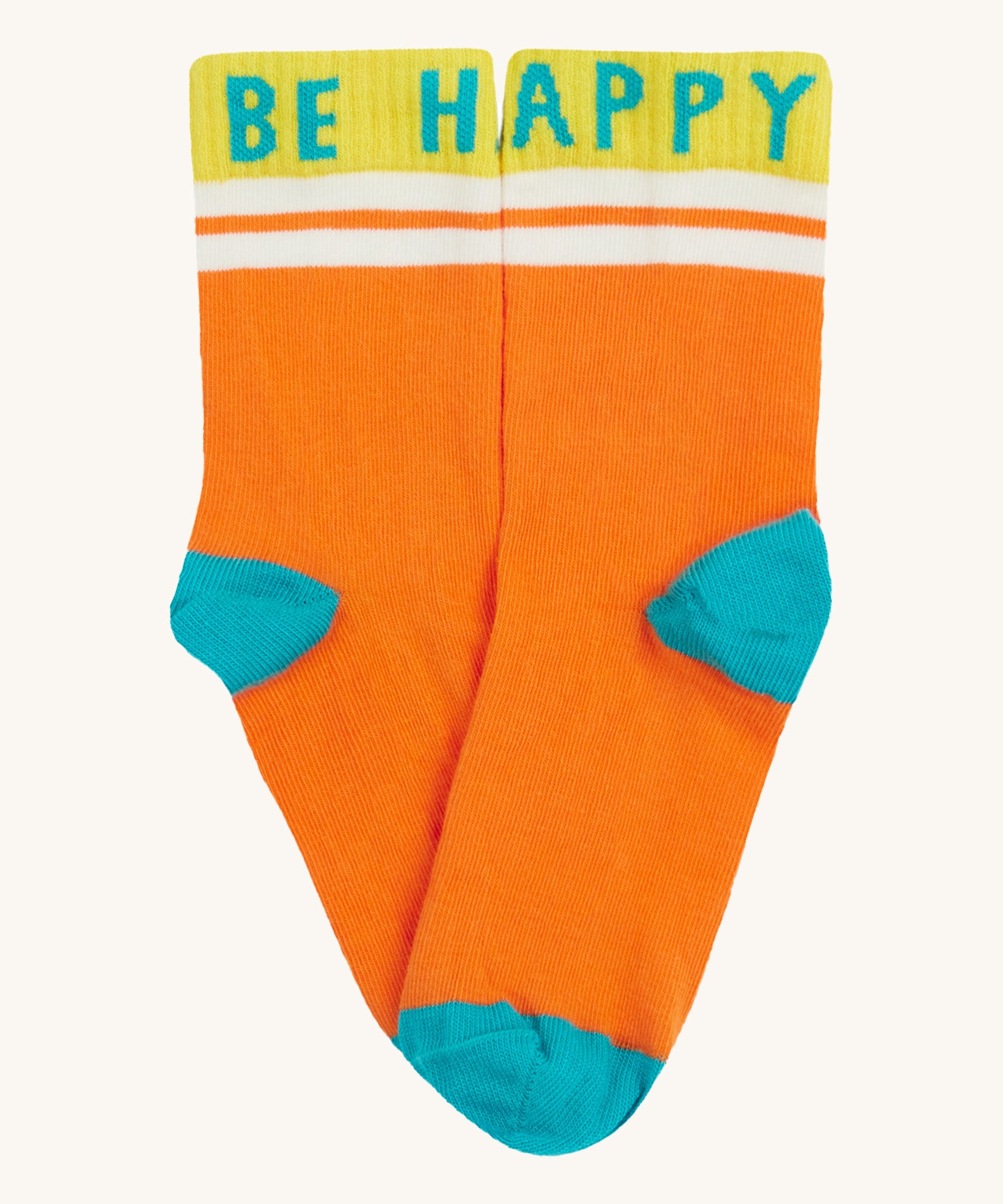 Close up of the Frugi orange sunnie socks. Showing the Be Happy slogan on the ankle cuff. Features a light blue heel and toe contrast panel on orange organic cotton fabric