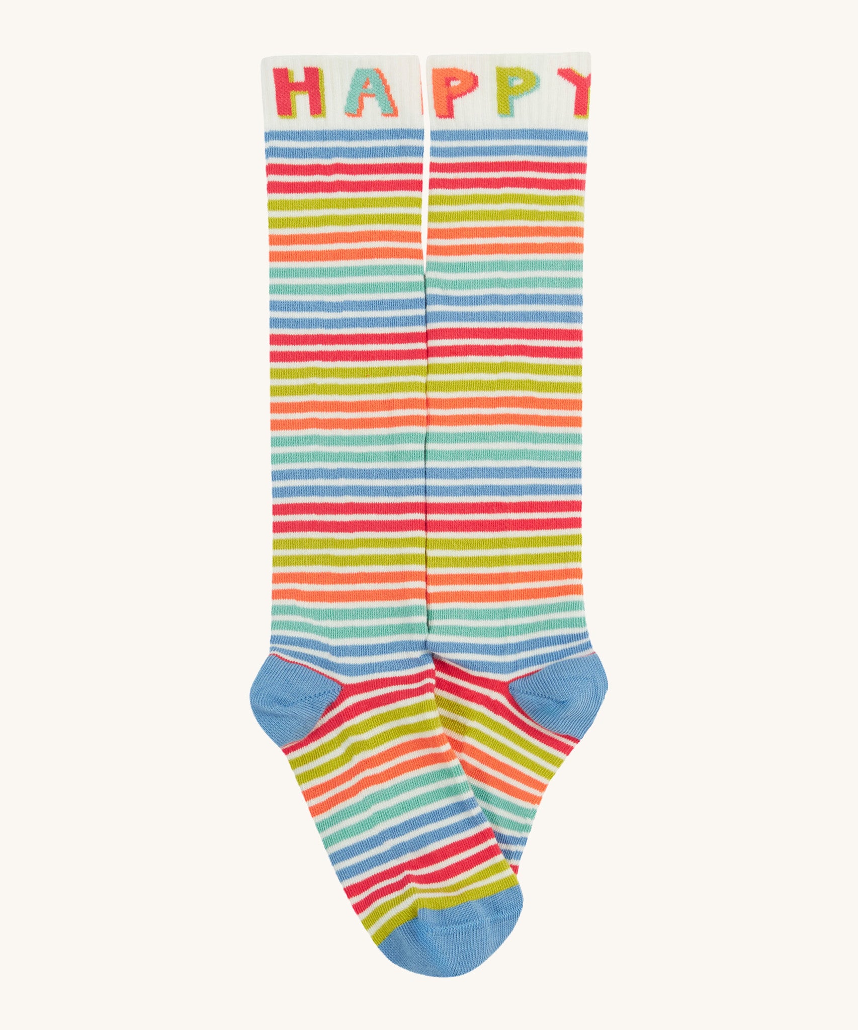 Frugi kids hygge knee high sock with happy slogan on the leg cuff with a light blue toe and heel panel on multicoloured striped organic cotton fabric