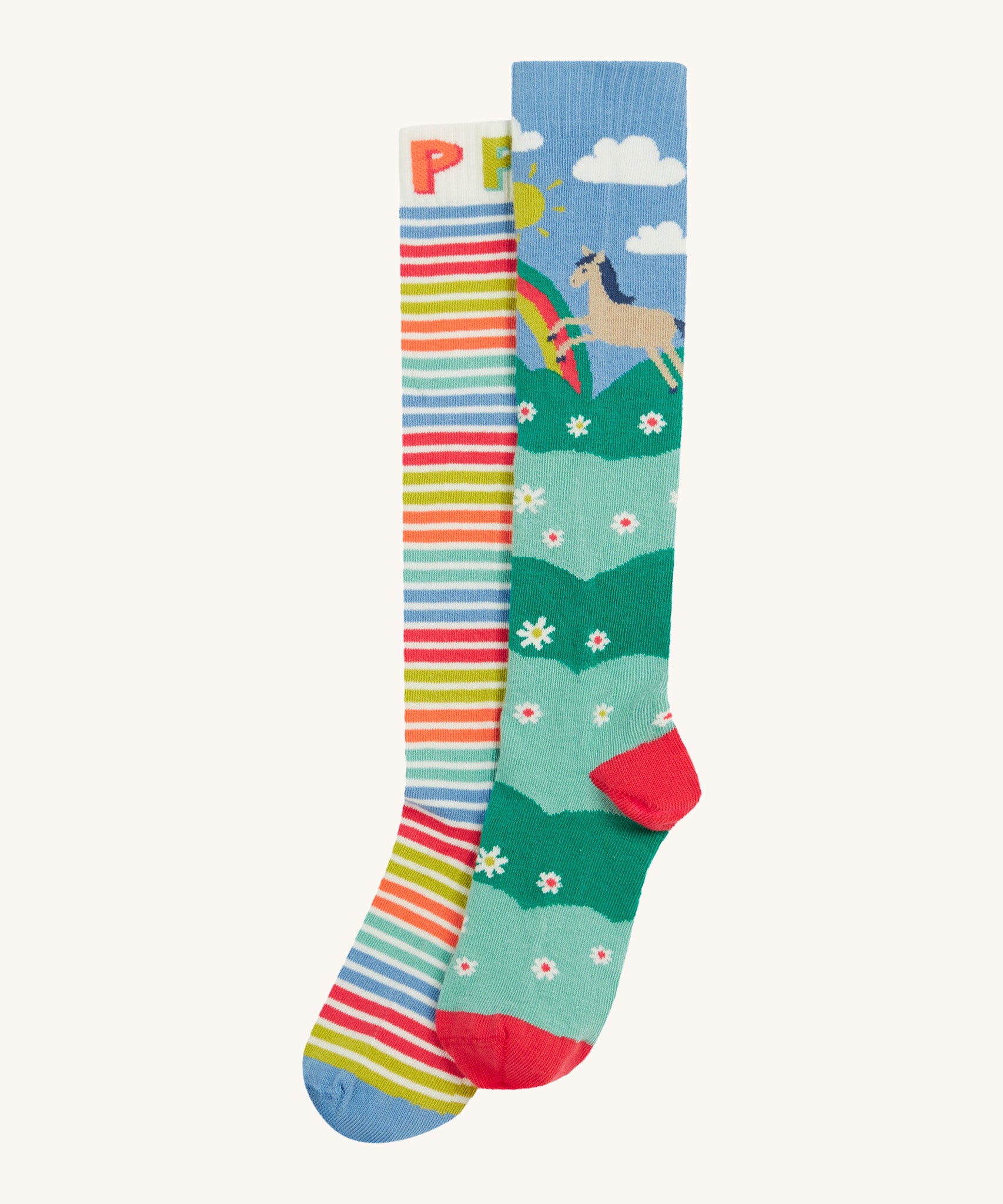 Frugi kids hygge knee high socks - GOTS organic cotton kids knee high socks with a multicoloured striped sock with light blue toe panel and a horse in a field of daisies design with toe and heel panel sock