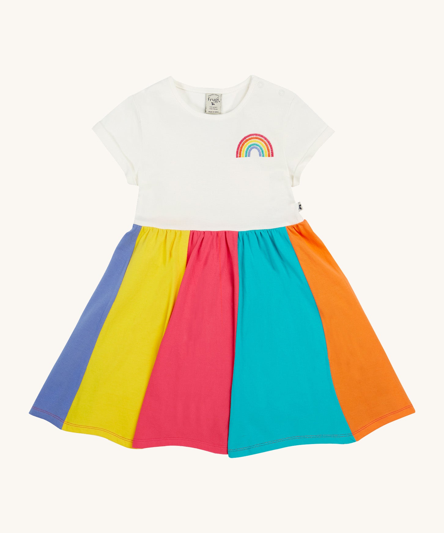 Frugi kids jersey rainbow dress - GOTS organic cotton kids dress with a white top half and a rainbow block colour bottom half. Features a rainbow embroidery on the top half of the dress.