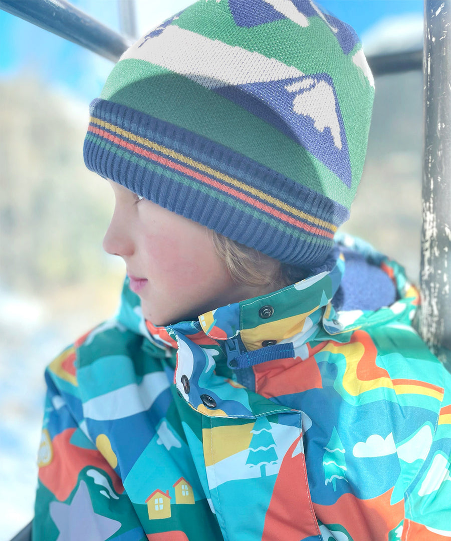 A closer look at the knit and bold stripe print on the Frugi Children's Voyager Reversible Hat - Navy Blue/Mountains