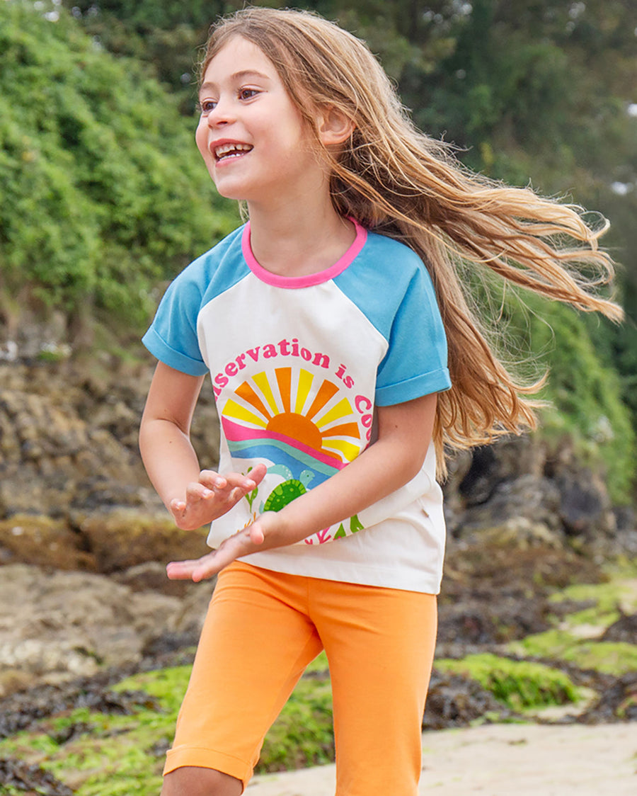  colourful shorts. The one in the back is a bright orange colour