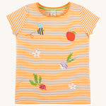 Frugi kids lifeboat stripe veg t-shirt - GOTS organic cotton kids t-shirt with orange and white stripes and orange neck trim. Features an appliqué of a bee with grey wings, a red apple, purple radish, red beetrooth and lilac flowers. 