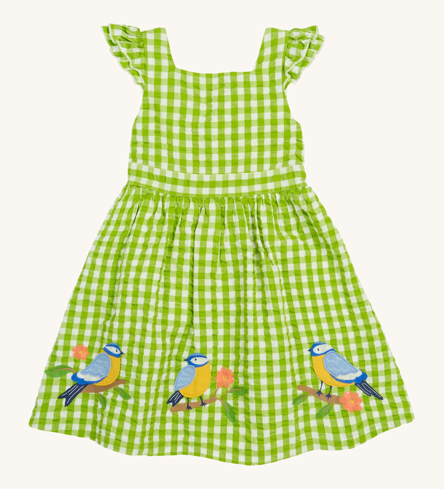 Frugi kids macaw gingam birds dress - GOTS organic cotton kids dress with green and white gingham, sleeveless with gentle ruffle with a back strap fastener. Features 3 appliqué  of different birds perched on a stick.