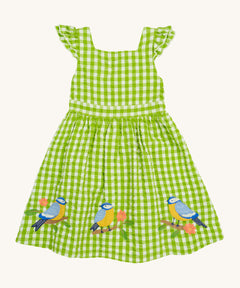 Frugi kids macaw gingam birds dress - GOTS organic cotton kids dress with green and white gingham, sleeveless with gentle ruffle with a back strap fastener. Features 3 appliqué  of different birds perched on a stick.