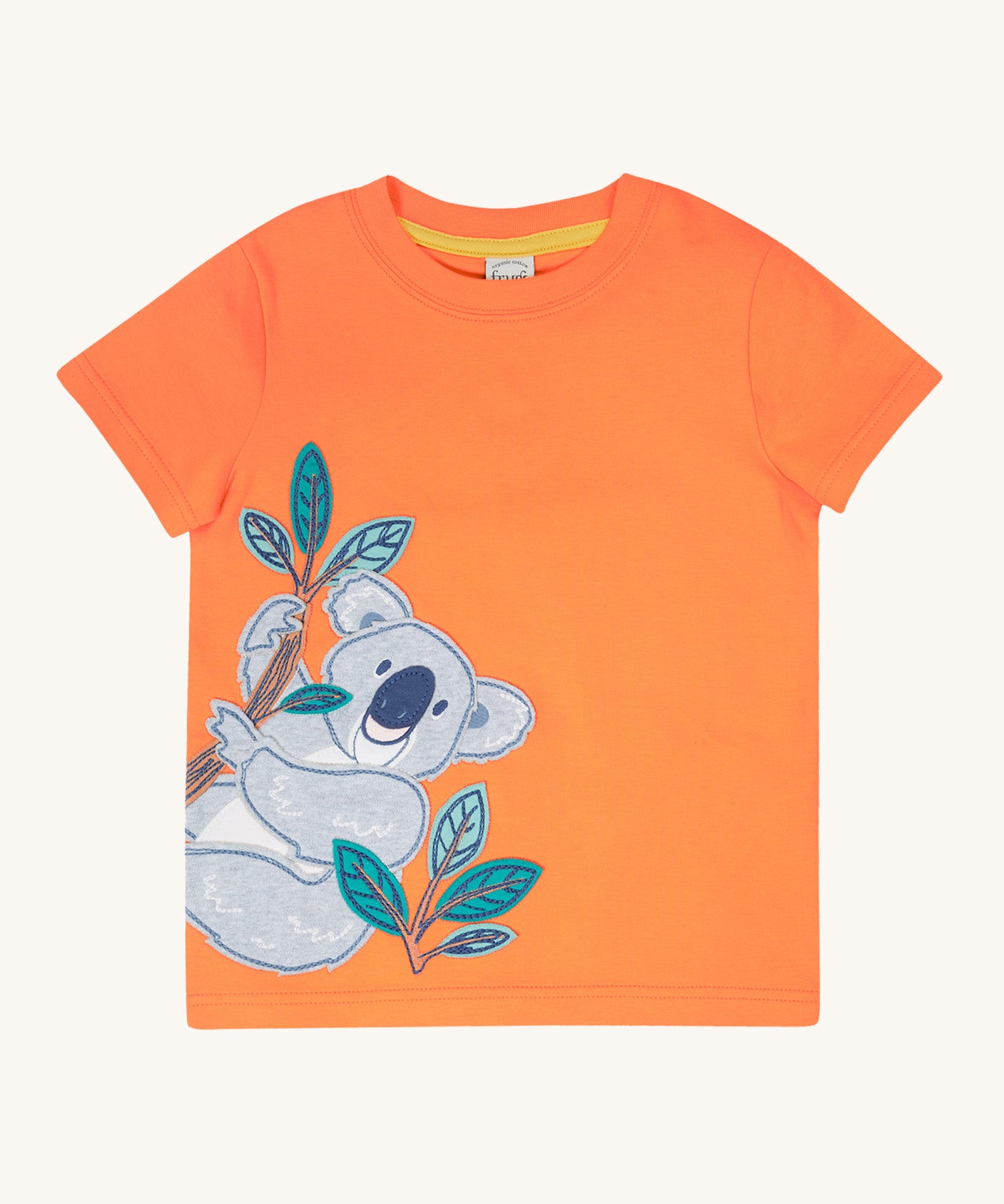 Frugi kids orange koala t-shirt - GOTS organic cotton Frugi kids t-shirt in light orange with short sleeves and a yellow trim on the inside of the neck. Features a grey koala applique hanging on embroidered bamboo shoots