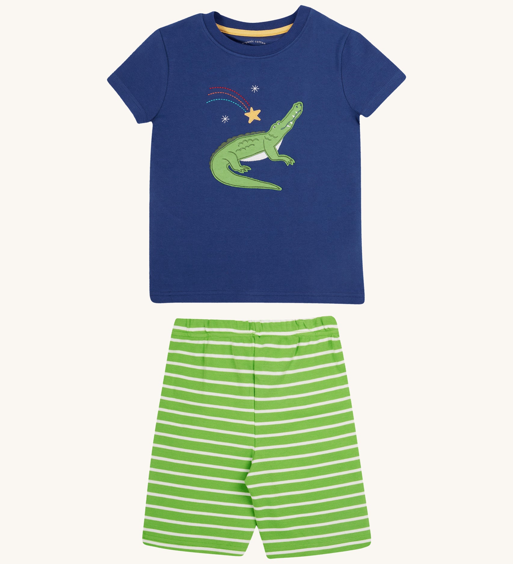 Frugi kids Porth crocodile pyjama set - GOTS organic cotton kids pyjama set with a navy short sleeve top and a green and white stripe shorts. Features an appliqué of a green crocodile on the top. 