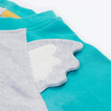 Close up of the Frugi kids koala raglan t-shirt. Showing the grey ears stitched loosely on the front panel on grey and blue organic cotton fabric