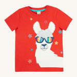 Frugi kids red llama character t-shirt - GOTS organic cotton Frugi t-shirt in red with a red neck trim and light blue inside neck trim. Features a white and grey llama appliqué wearing rainbow sunglasses and surrounded by different coloured embroidered stars. 