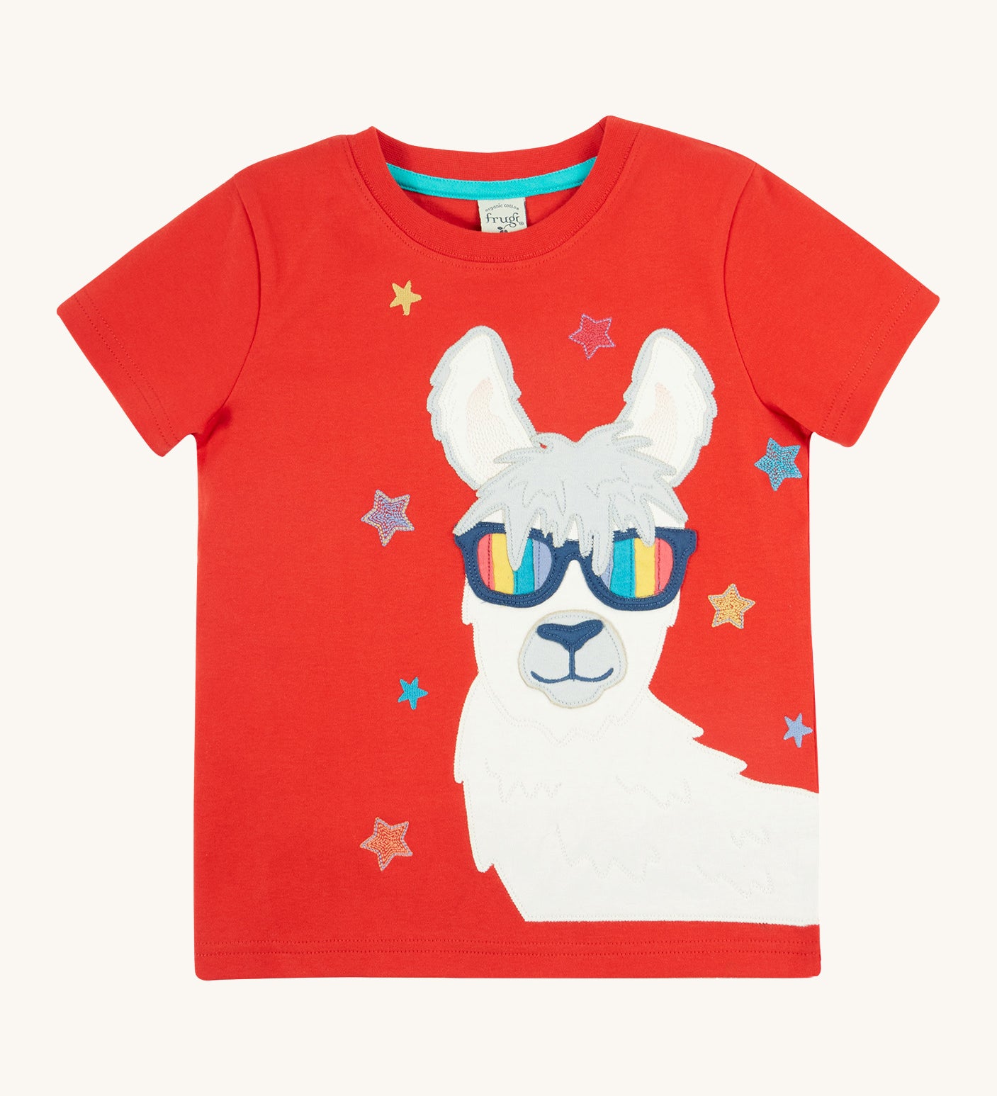 Frugi kids red llama character t-shirt - GOTS organic cotton Frugi t-shirt in red with a red neck trim and light blue inside neck trim. Features a white and grey llama appliqué wearing rainbow sunglasses and surrounded by different coloured embroidered stars. 