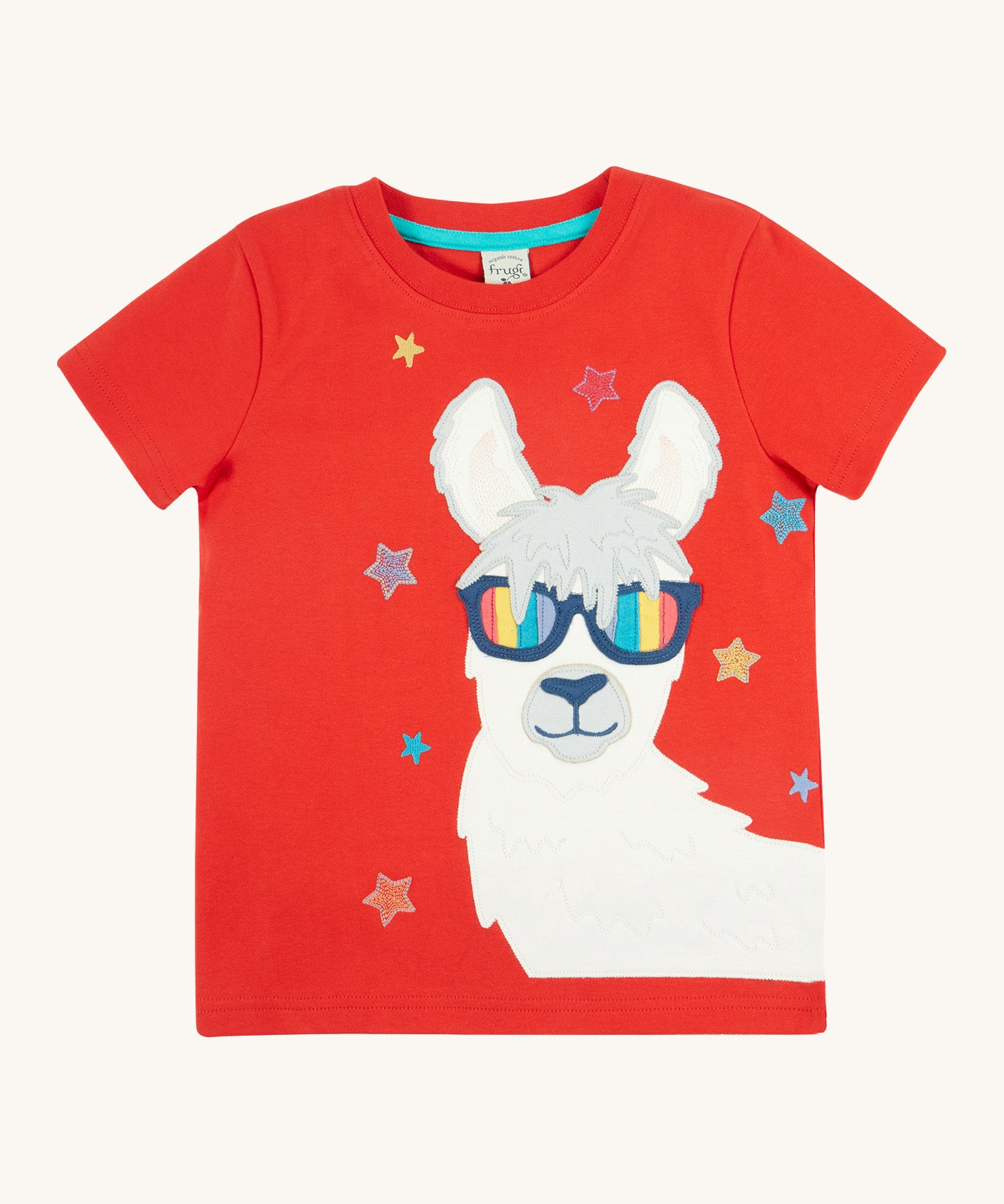 Frugi kids red llama character t-shirt - GOTS organic cotton Frugi t-shirt in red with a red neck trim and light blue inside neck trim. Features a white and grey llama appliqué wearing rainbow sunglasses and surrounded by different coloured embroidered stars. 