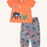 Frugi Rowenna outfit, lemur laugh - GOTS organic cotton kids two piece outfit with a coral short sleeve top and light purple bottoms. Feature an appliqué of a lemur on the top and printed lemurs with coloured leaves on the bottoms