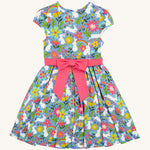 Frugi kids bunny bounce skater dres - GOTS organic kids skater dress in pastel blue, sleeveless with a pink bow tie waist band. Features a print of different bunnies and  coloured flowers.