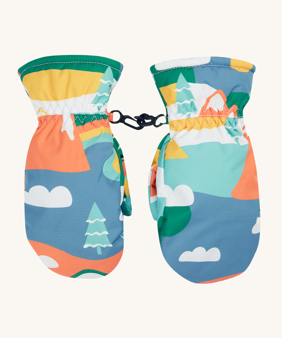 Frugi Snow & Ski Mittens - Alpine Adventures. Made from 100% post-consumer recycled plastic in an Alpine Adventures print featuring snow covered trees and mountains in colourful block colours. The insides are wadded and have a fleece lining, grippy palms,