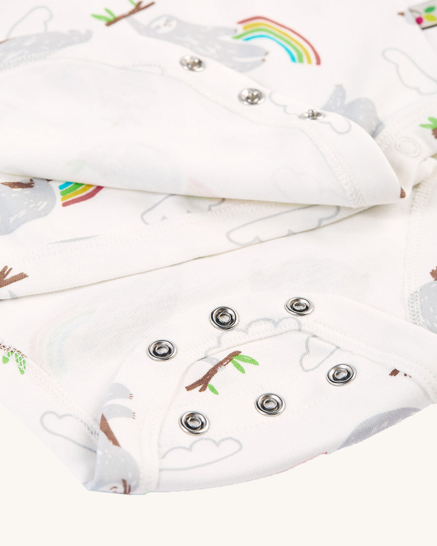 The Frugi Sleepy Sloths Shay Body cotton kimono style baby bodysuits with long sleeve and a white body