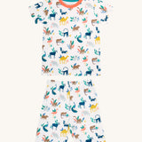 Frugi kids snooze wildlife pyjama set - GOTS organic cotton kids 2 piece pyjama set with a short sleeve top with orange neck trim and white shorts. Features prints of different wild animals.