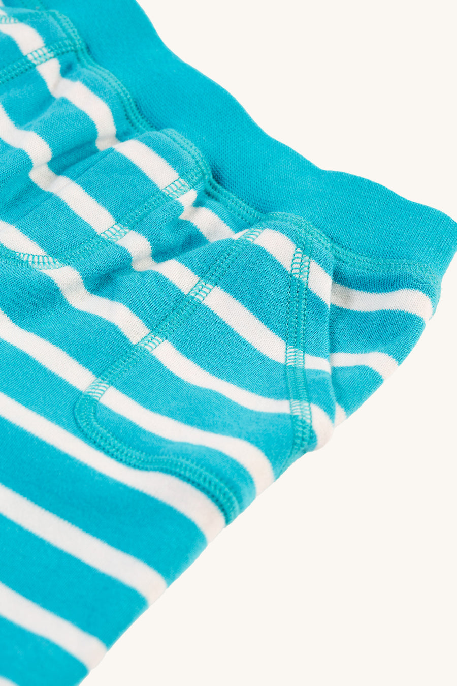  light aqua blue and white Breton striped shorts have a comfy elasticated waistband and two handy pockets