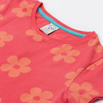 Close up of the Frugi kids flora fun koala t-shirt. Showing the neck detail with light blue trim on the inside on pink organic cotton fabric with pastel orange floral print