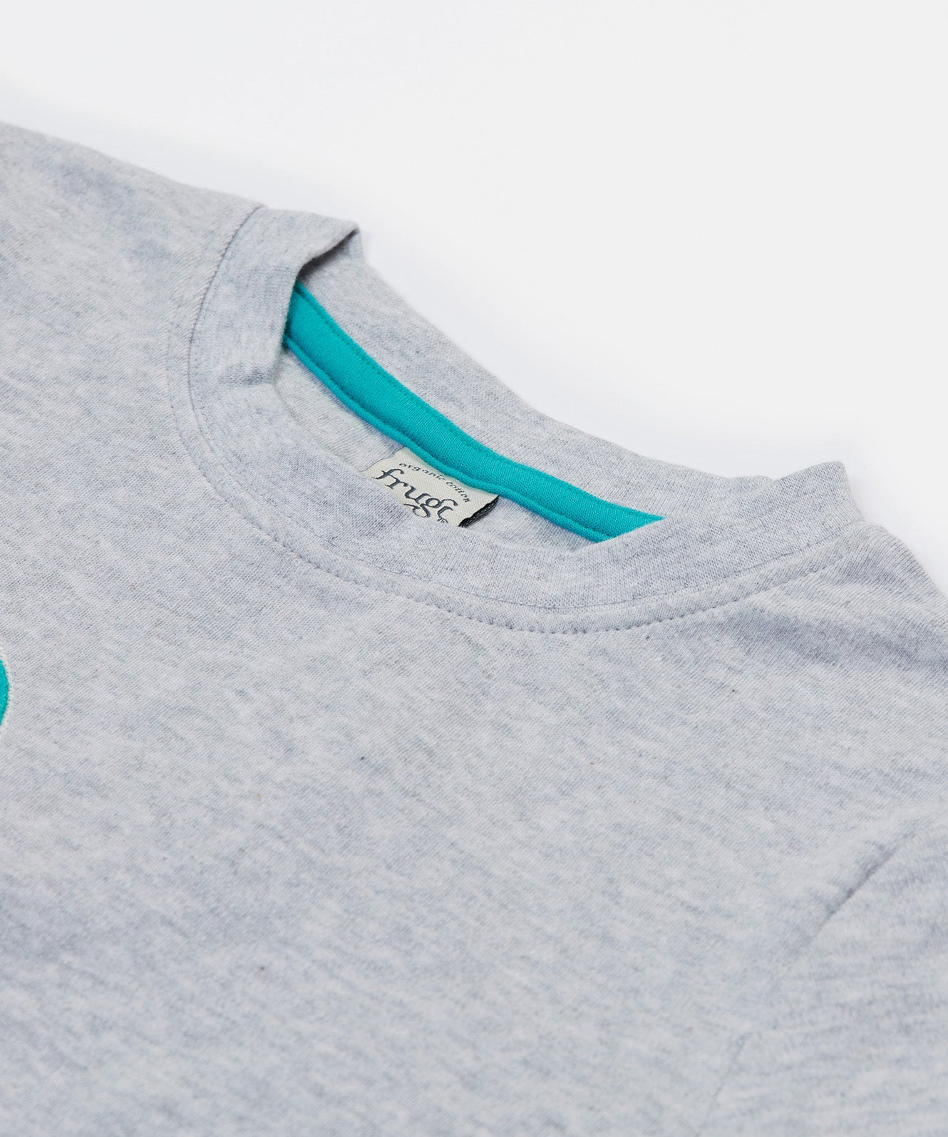 A close up of the Frugi kids grey marl lemur character t- shirt. showing the light blue trim on the inside of the neck grey marl organic cotton fabric