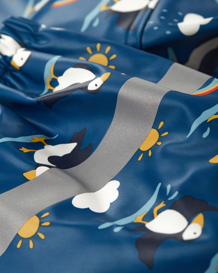 Close up of the reflective stripes on the Frugi eco-friendly puddle buster rain jacket