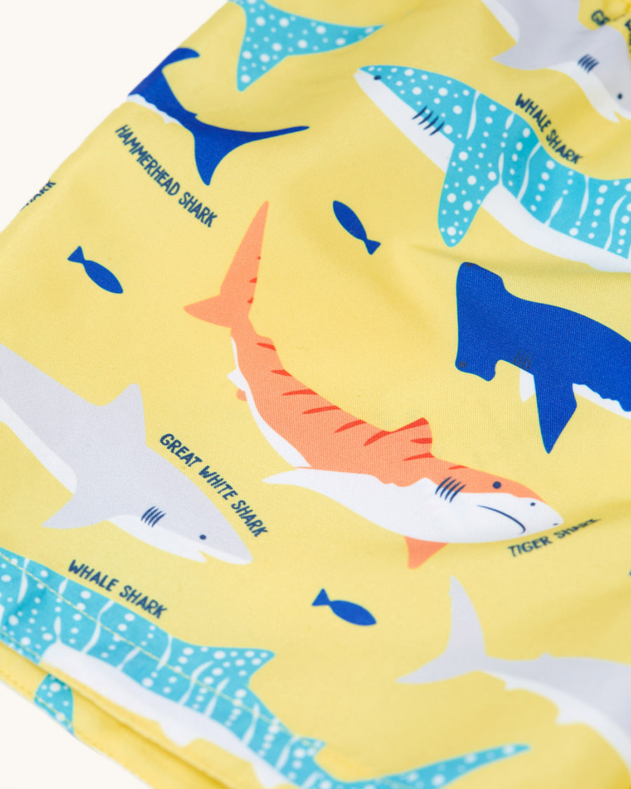 A close up of the light blue waist drawstring on the Frugi Boscastle Board Shorts - Banana Sharks