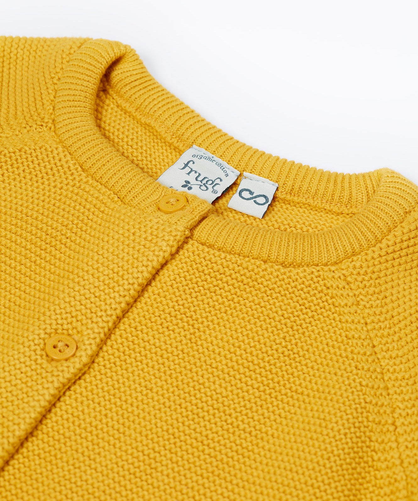 A close up of the collar of the Frugi yellow koala organic knitted cotton cardigan 