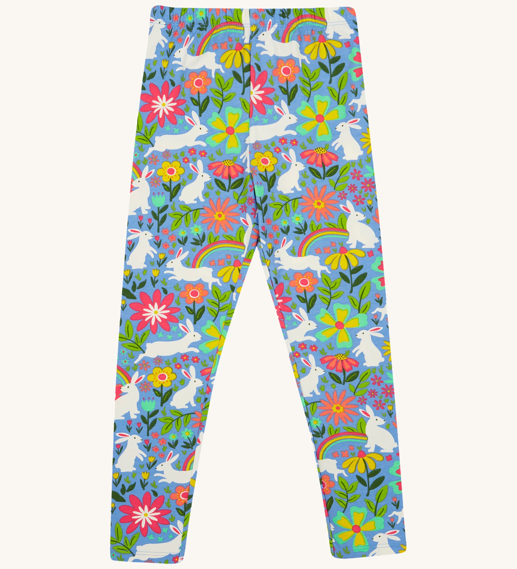 Frugi kids bunny bounce libby leggings - GOTS organic cotton kids light purple leggings. Features a flower and rainbow design with white bunny rabbits. 