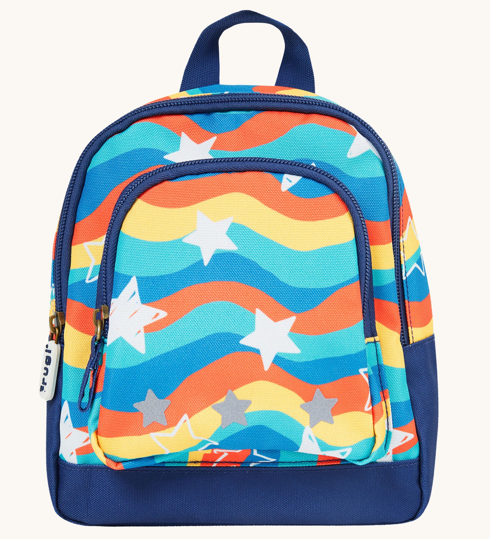 Frugi Little Adventurers Backpack - Wavy Stars. Made from post-consumer recycled plastic, this Little Adventurers Backpack from Frugi comes in a rainbow print, and white and grey stars. This bag has a detachable rein, two zipped pockets, reflective print 