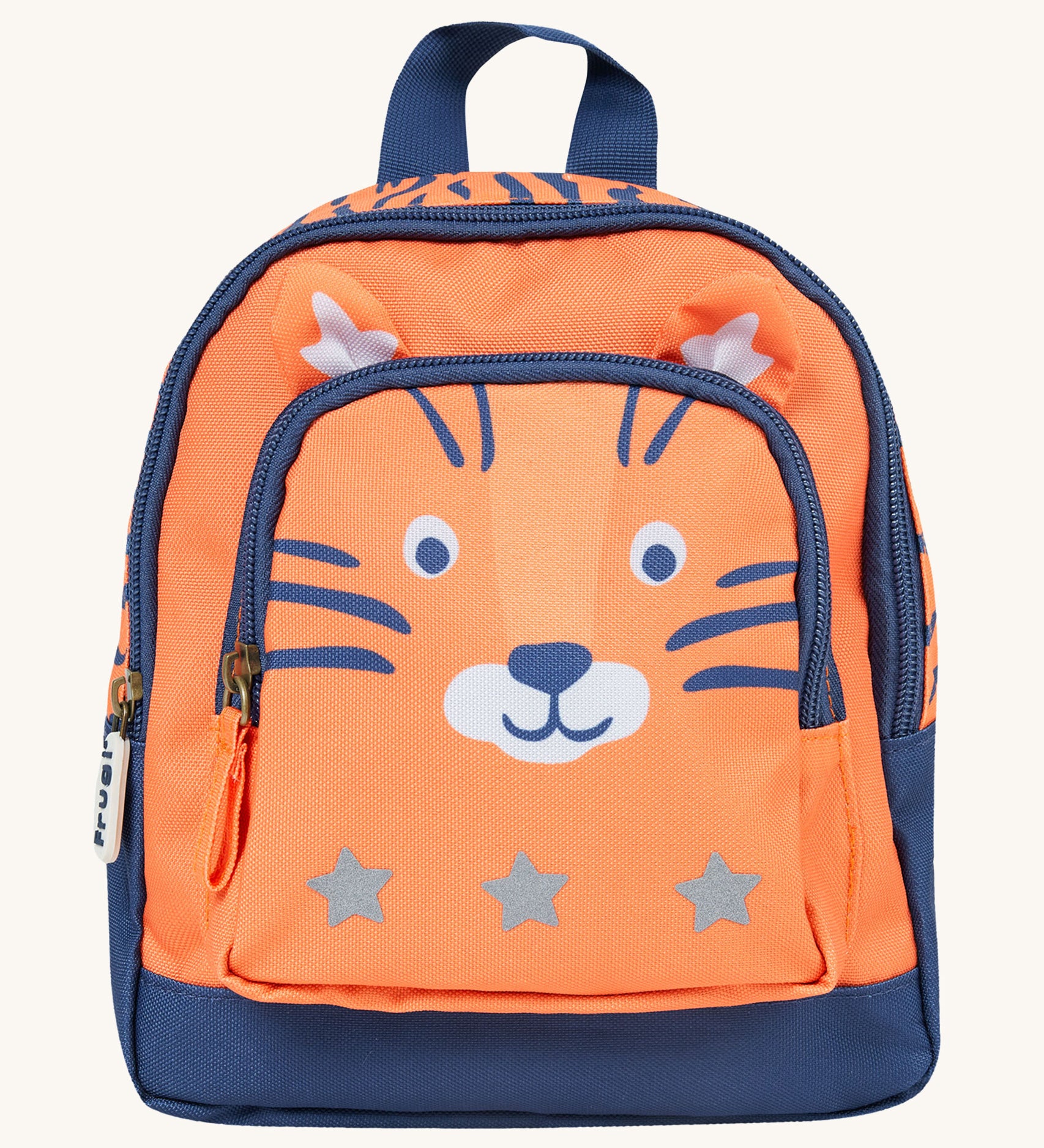 Little Adventurers Backpack - Salamander/Tiger. Made from post-consumer recycled plastic, this Little Adventurers Backpack from Frugi comes in an orange and navy blue Tiger print. This bag has a interactive tiger ears, a detachable rein, two zipped pocket